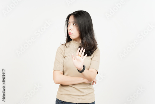Stop or Rejection Hand Gesture Of Beautiful Asian Woman Isolated On White Background © Sino Images Studio