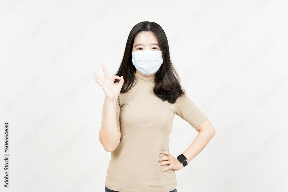 Wearing Medical Mask for Preventing Corona Virus Of Beautiful Asian Woman Isolated On White Wearing Medical Mask for Preventing Corona Virus Of Beautiful Asian Woman Isolated On White
