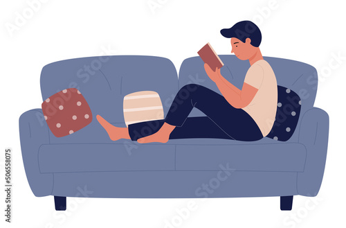 Boy lying on sofa to read and relax with paper book from library vector illustration. Cartoon guy reading in lazy comfort pose on couch with pillows isolated on white. Lifestyle, youth concept
