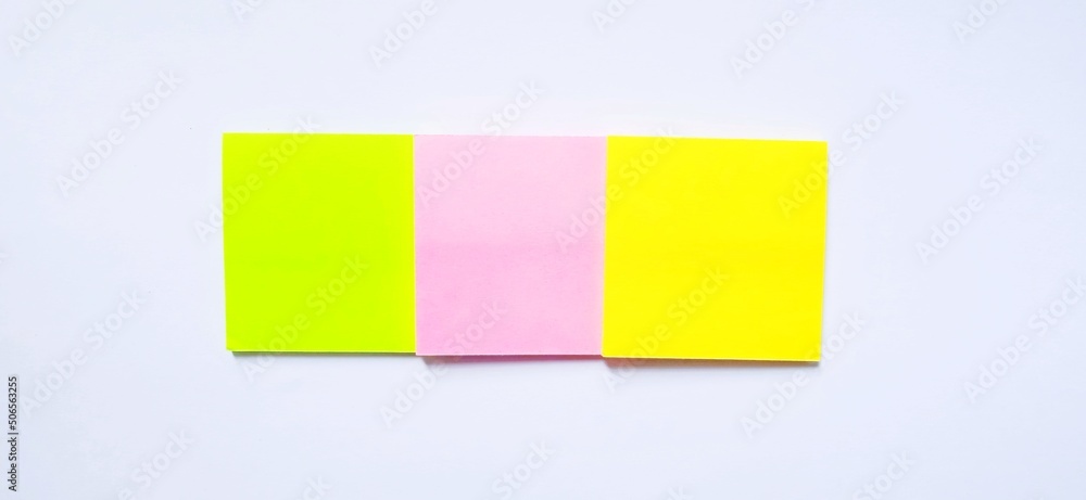 Isolated blank sticky notes on the gray white background. Education picture design concept. Isolated blank sticky notes on the gray white background. Education picture design concept.