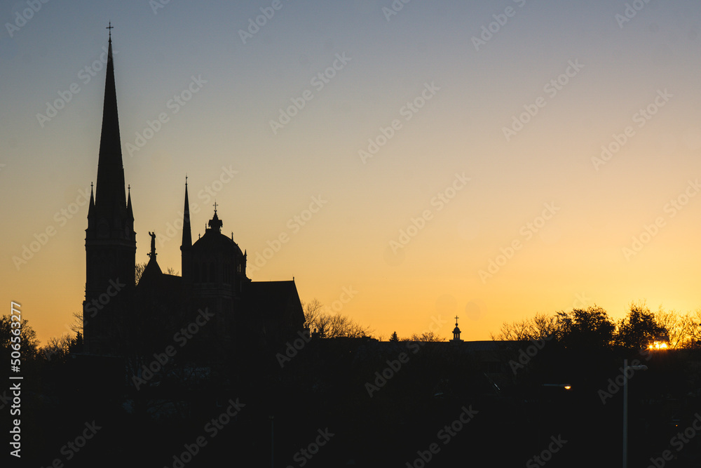 Silhouette of the Longueuil Cathedral at sunrise in Quebec, Canada