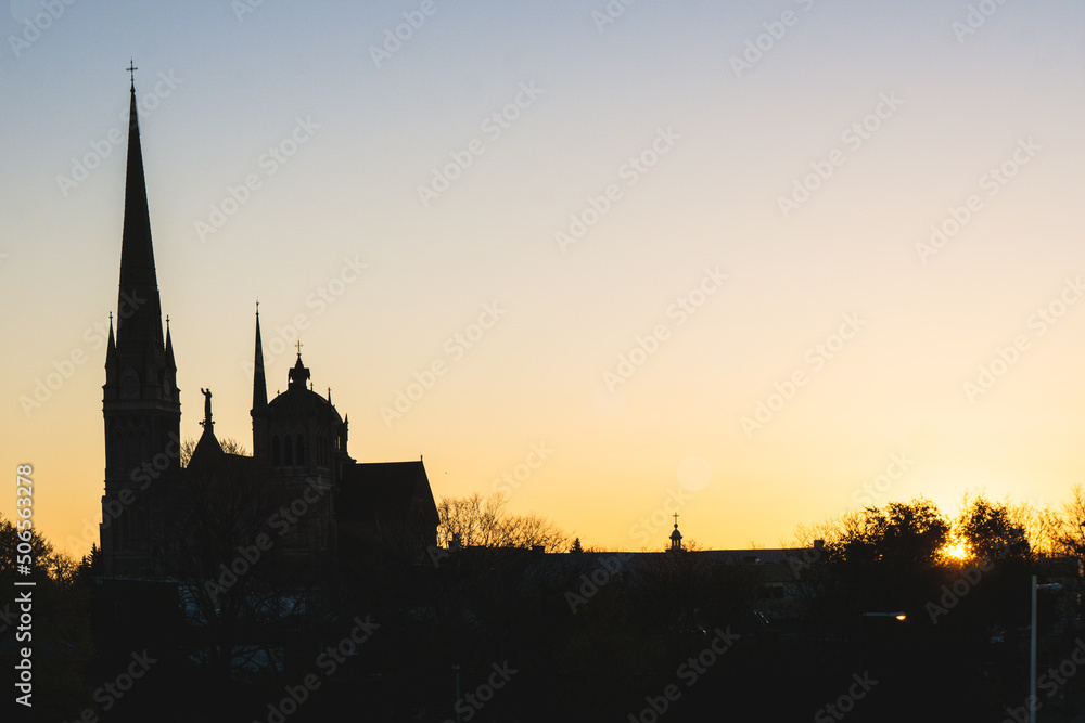 Silhouette of the Longueuil Cathedral at sunrise in Quebec, Canada