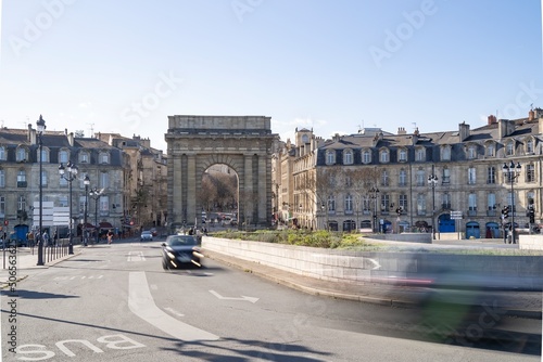 The porte de Porte de Bourgogne in Bordeaux France during the daytime with the city traffic