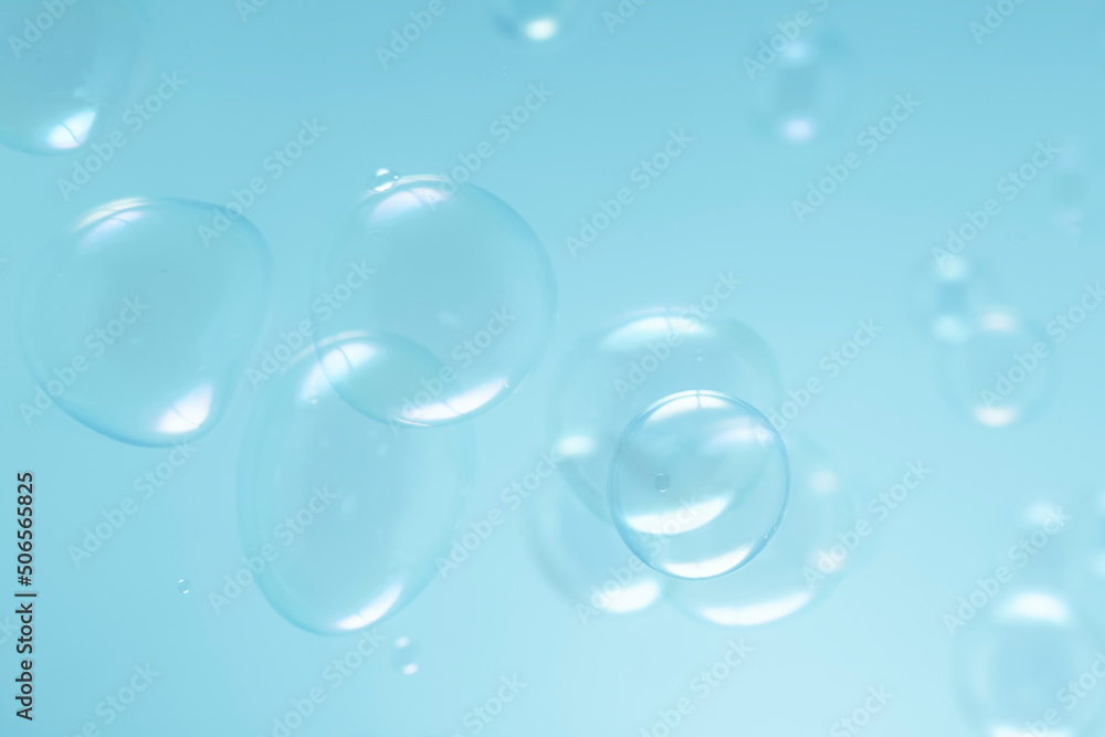 Beautiful Transparent Blue Soap Bubbles Floating in The Air. Soap Sud Bubbles Water	
