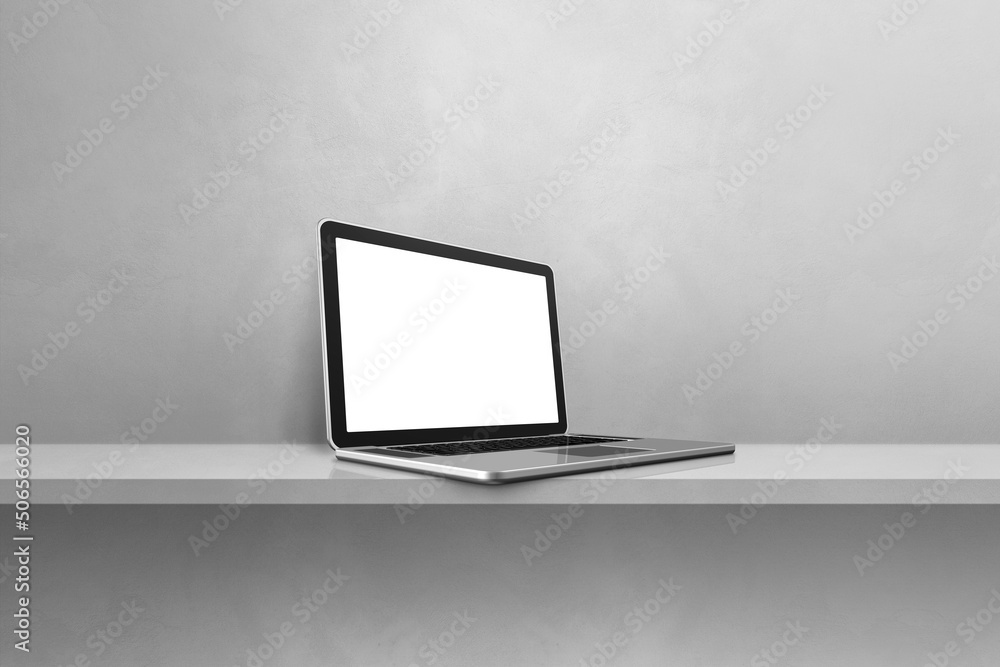 Laptop computer on grey shelf background Laptop computer on grey shelf background