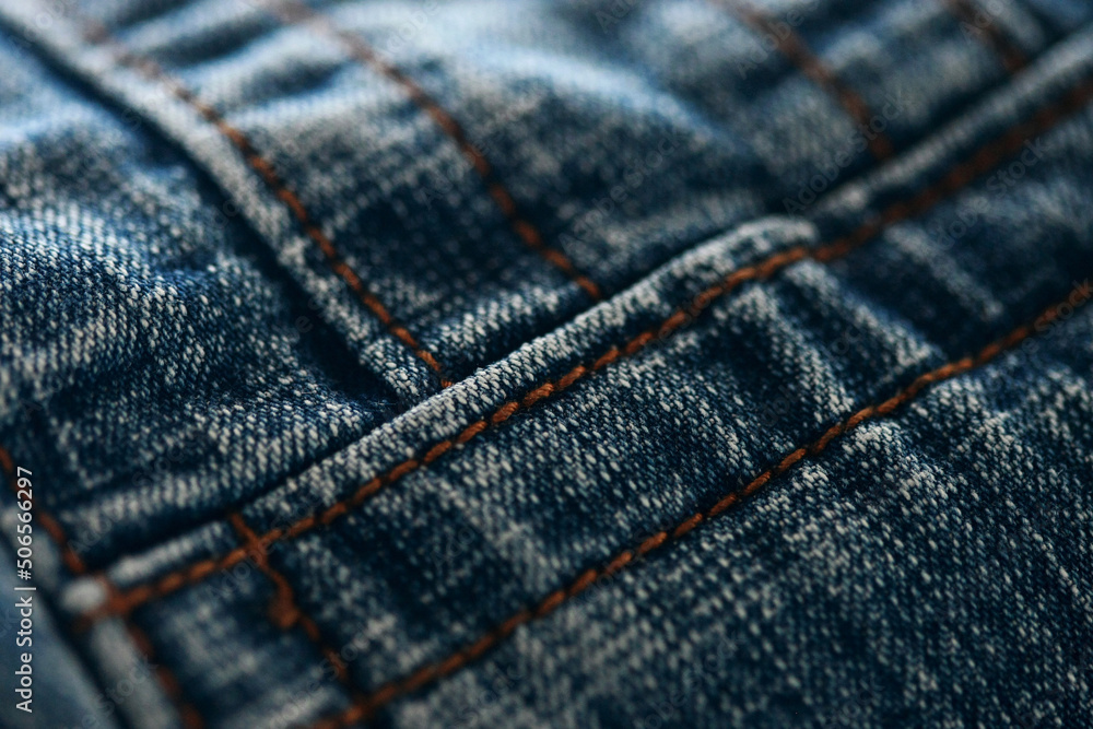 Jeans denim texture close up , focus only one point , soft blured background wallpaper Jeans denim texture close up , focus only one point , soft blured background wallpaper