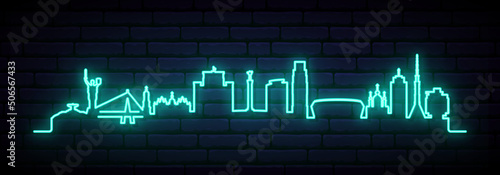 Blue neon skyline of Kyiv. Bright Kyiv City long banner. Vector illustration.