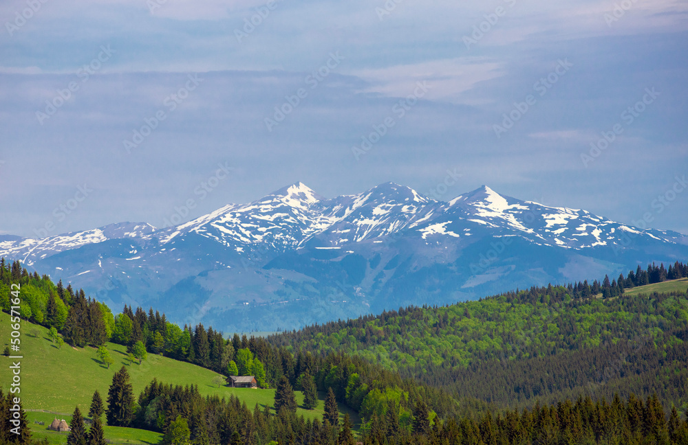 Landscape of the Calimani mountains with the snow-covered peak