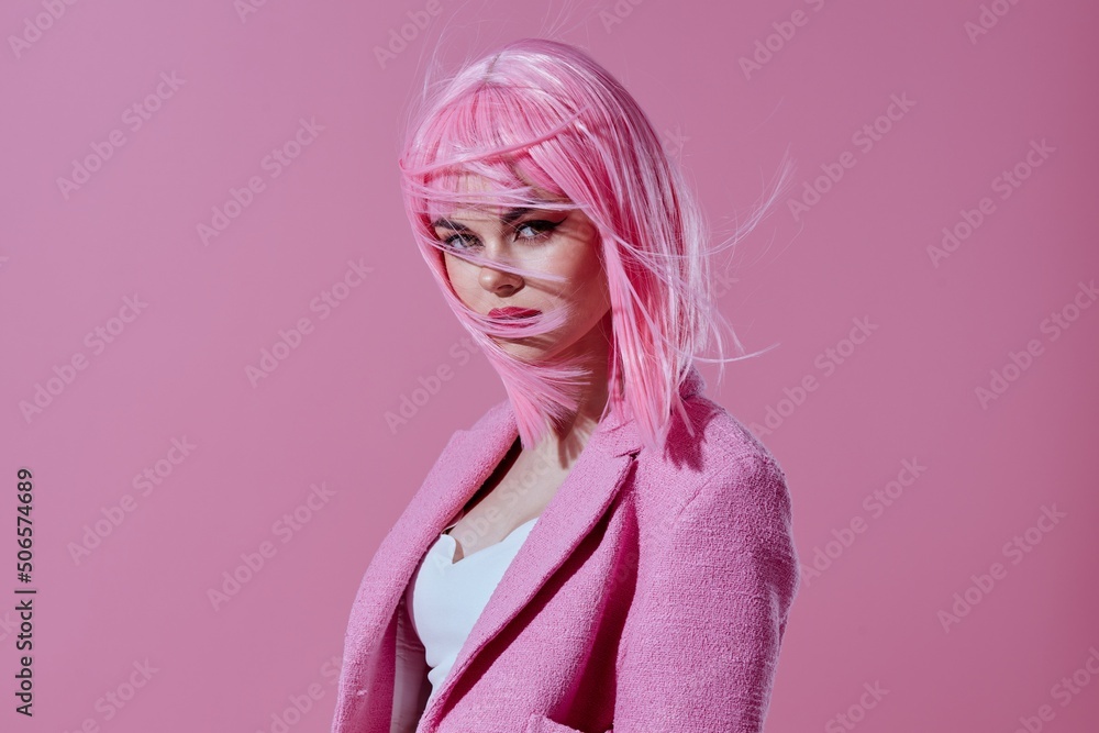 Portrait of a charming lady attractive look pink wig stylish clothes color background unaltered Portrait of a charming lady attractive look pink wig stylish clothes color background unaltered