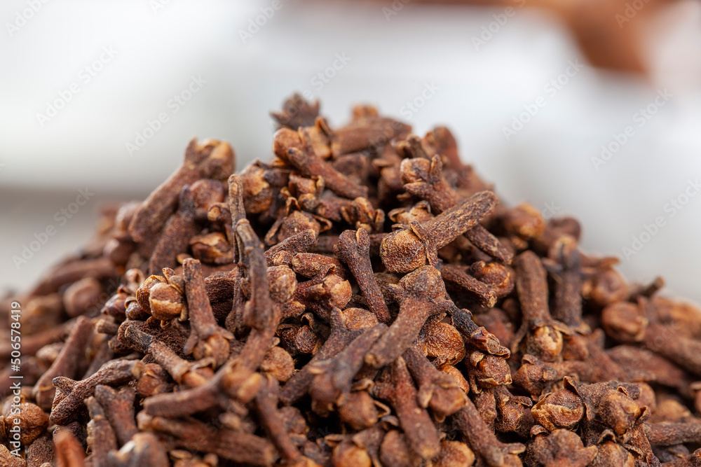 dried aromatic spices of cloves on the table dried aromatic spices of cloves on the table