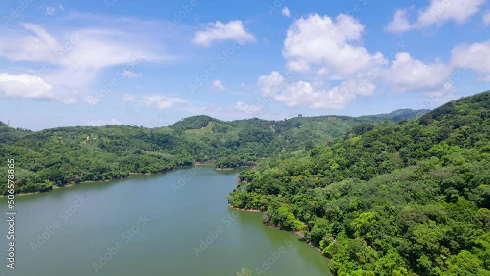 Aerial view Drone Hyperlapse shot of Tropical landscape rainforest with clouds flowing over mountain in phuket Thailand.Nature environment concept Aerial view Drone Hyperlapse shot of Tropical landscape rainforest with clouds flowing over mountain in phuket Thailand.Nature environment concept