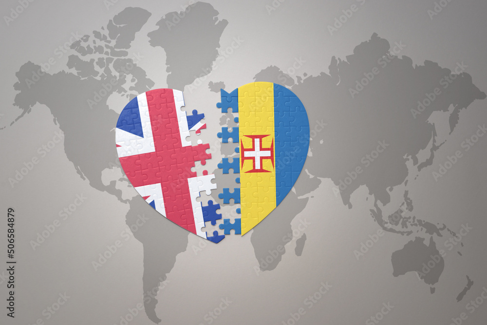 puzzle heart with the national flag of madeira and great britain on a ...