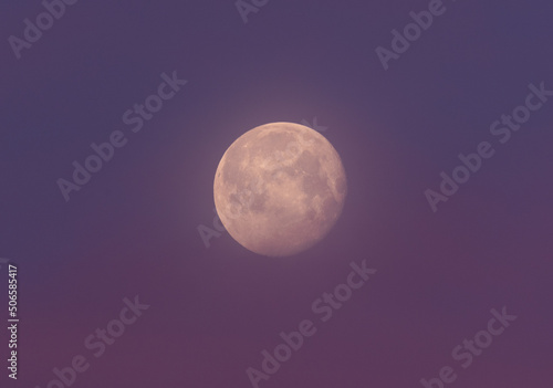 A cold winter day was coming to an end when the Moon started to creep up behind the mountain. Showing in full majestic glory.