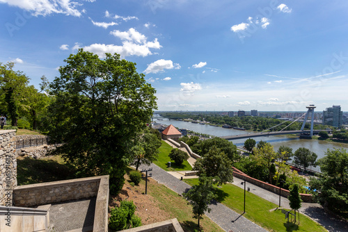 View of the Most SNP bridge in Bratislava from the castle hill © skovalsky