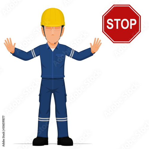 An industrial worker is raise hand to stop
