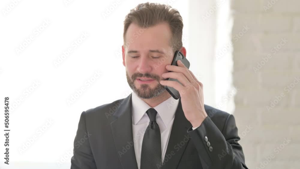 Young Businessman Talking on Phone, Discussion Young Businessman Talking on Phone, Discussion