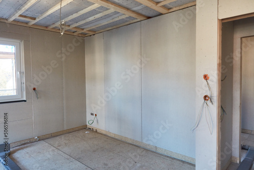 Interior of room on construction site of house construction