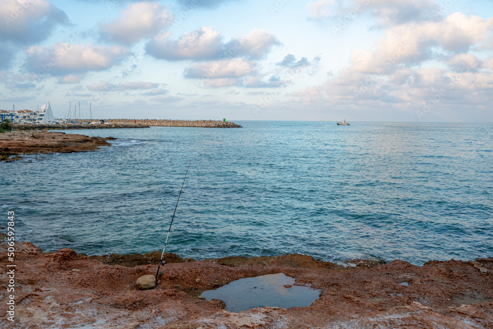 Fishing roads are set on a coast of Mediterranean sea, Spain.