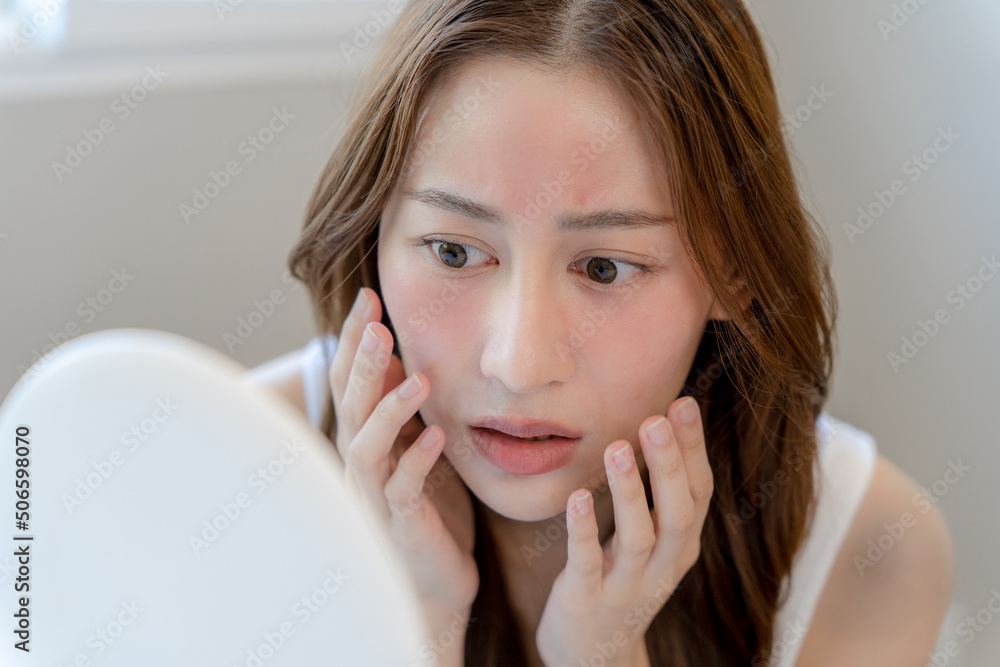 Young woman asian are worried about faces Dermatology and allergic to