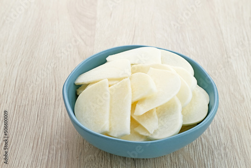 A bowl of fresh jicama or bengkoang (Jicama slices), gut health. 