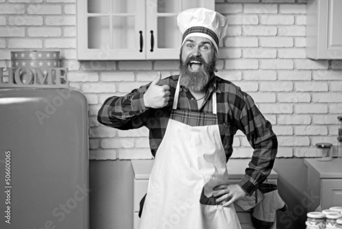 Professional chef man showing sign for delicious.