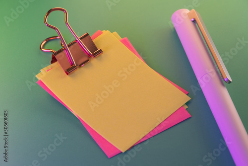 Blank colorful sticky notes and pen