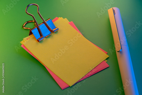 Blank colorful sticky notes and pen