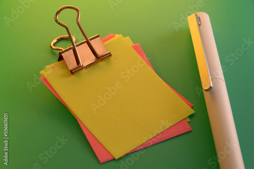 Blank colorful sticky notes and pen
