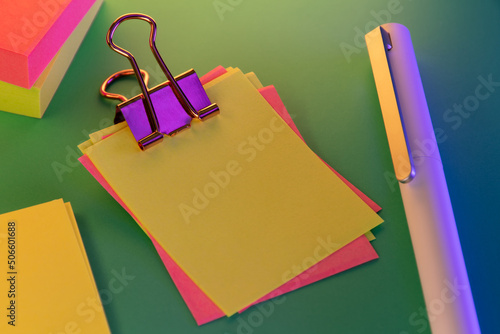 Blank colorful sticky notes and pen