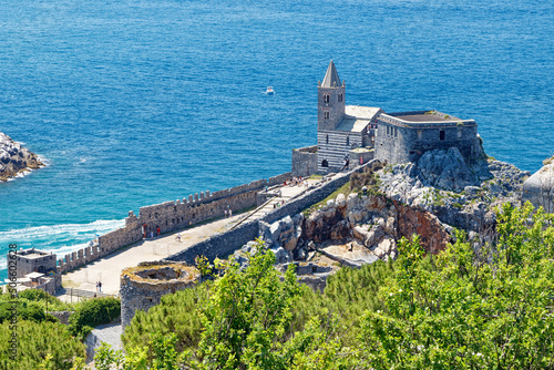 Saint Peter church in Portovenere, Italy, a small restored Catholic church, dating back to 1198 and located atop a rocky promontory overlooking the sea.