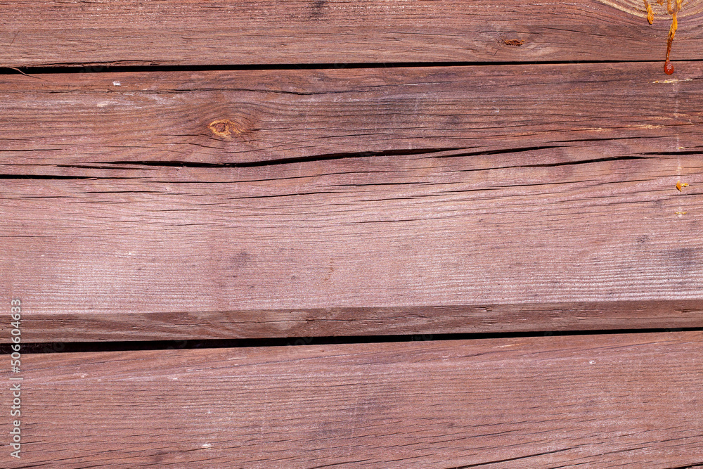 an old wooden surface with a number of damages an old wooden surface with a number of damages