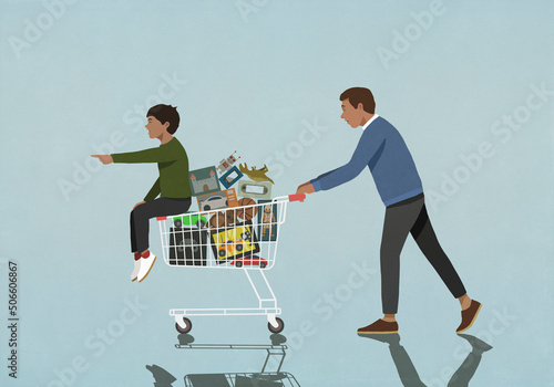 Father pushing shopping cart with son and toys
