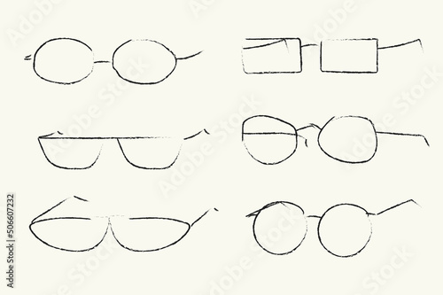 hand-drawn doodle set of eyeglass frames on a beige background. vector illustration