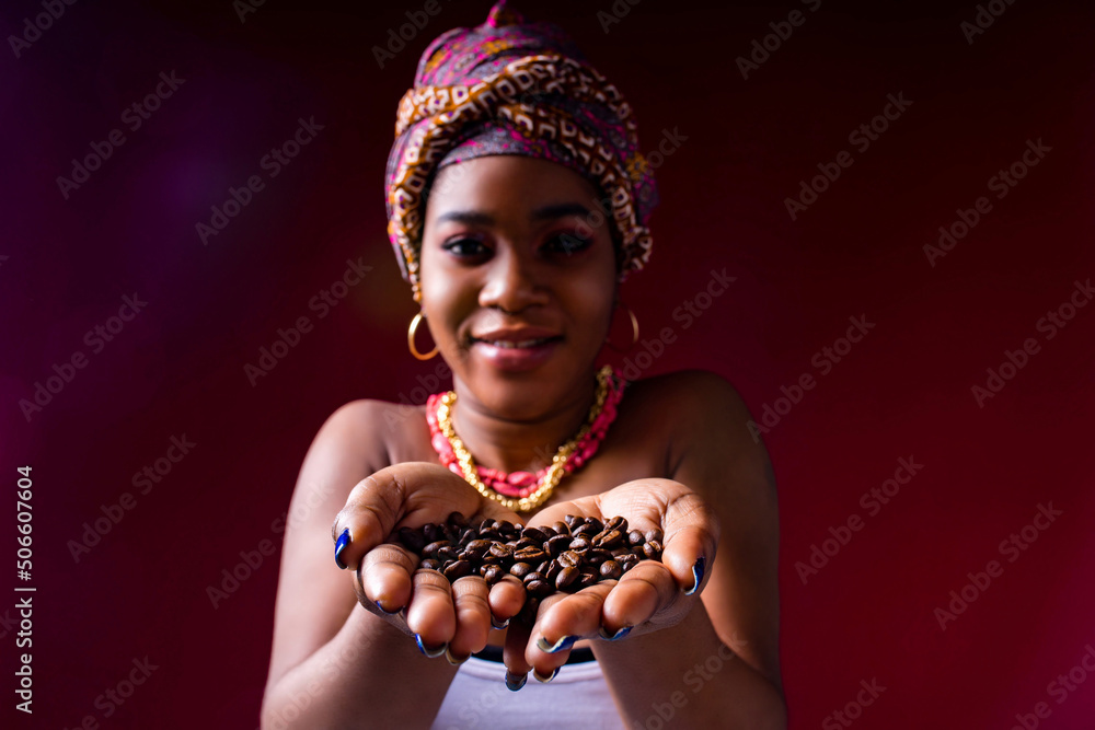 beautiful africa-american woman with turban ower the head in studio - obrazy, fototapety, plakaty 