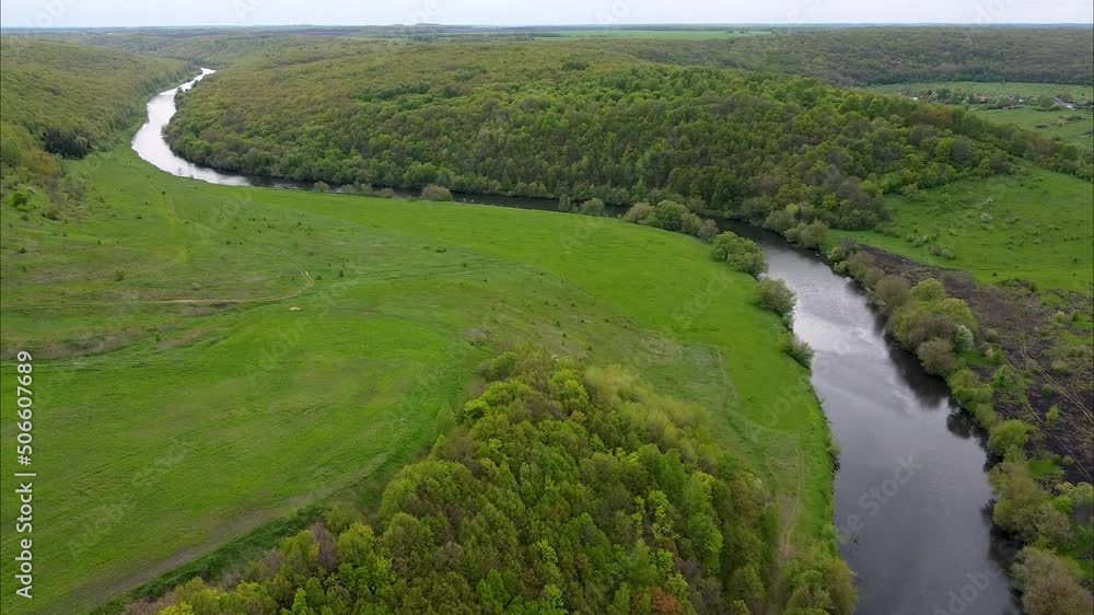 View of the river from above. Flight over water and forest trees from a height. Epic panoramic shot. Spring flood. Travel by kayak. Green background View of the river from above. Flight over water and forest trees from a height. Epic panoramic shot. Spring flood. Travel by kayak. Green background