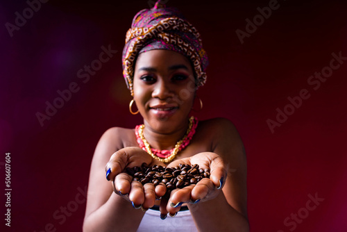 beautiful africa-american woman with turban ower the head in studio photo