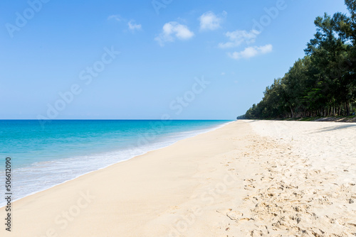 Fototapeta Naklejka Na Ścianę i Meble -  Clean sandy beach with beautiful blue sea, tropical island in south of Thailand, summer holiday destination