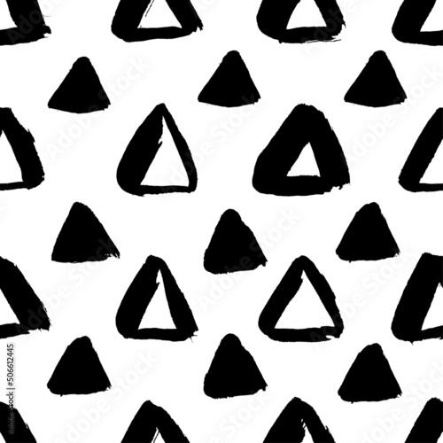 Seamless pattern with ink drawn simple triangles on white background. Black ink grunge texture. Design element for fabric, textile, wrapping paper. 