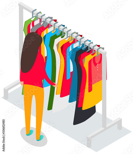 Girl choosing clothes for trousers and shirts fluttered on hangers, elements of wardrobe in store. Woman standing in front of hangers and choosing outfit. Fashion, clothes store, shopping concept.