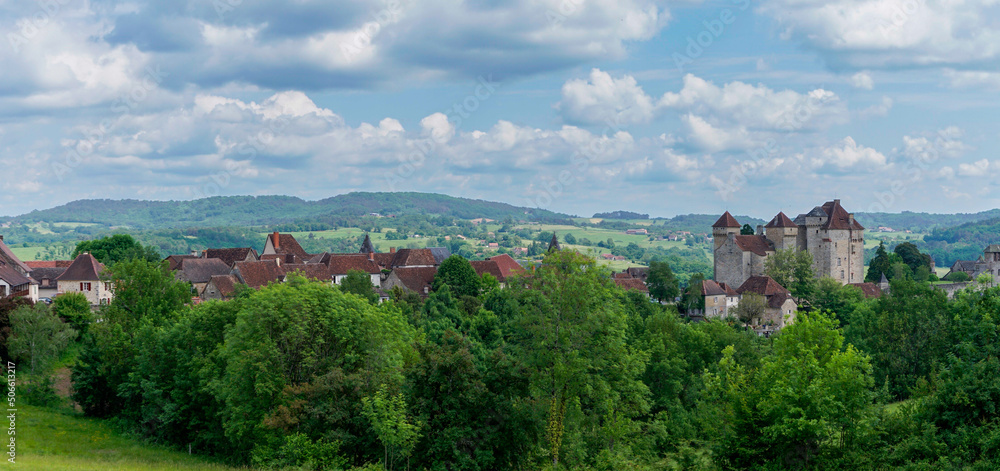 panorama view of the idyllic French village of Curemonte and the Plas Chateau in the Dordogne Valley