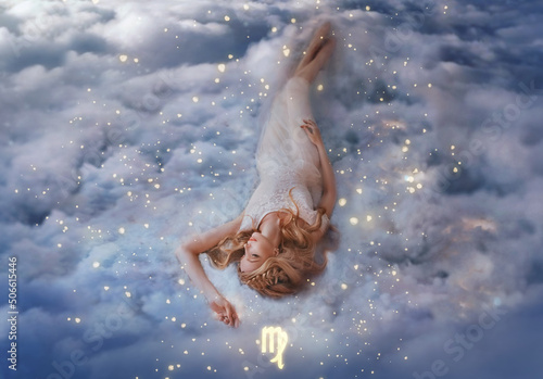 Fantasy woman holy goddess lies dreaming on white clouds, girl in image of zodiac sign Virgo. Astrological symbol horoscope, blue sky heaven, shining stars magical divine light, cosmos universe space photo
