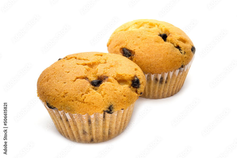 Vanilla muffins with chocolate on the white background