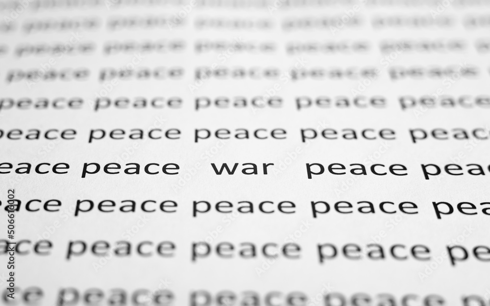 War and peace concept. Close-up of printed text of words Peace and one word War on white paper. Low angle view, selective focus, macro photo War and peace concept. Close-up of printed text of words Peace and one word War on white paper. Low angle view, selective focus, macro photo