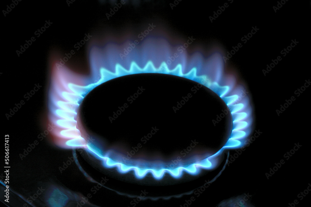 gas burner with burning gas. dark background