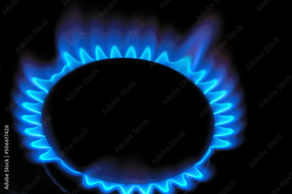 gas burner with burning gas. dark background gas burner with burning gas. dark background