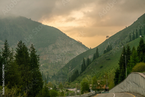 beautiful Horse in Mountains and amazing landscape with haze in southern in Kazakhstan - mountains  ( road ro resort 