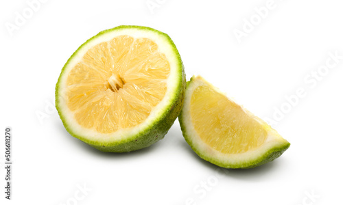 Half lemon and slice isolated on white