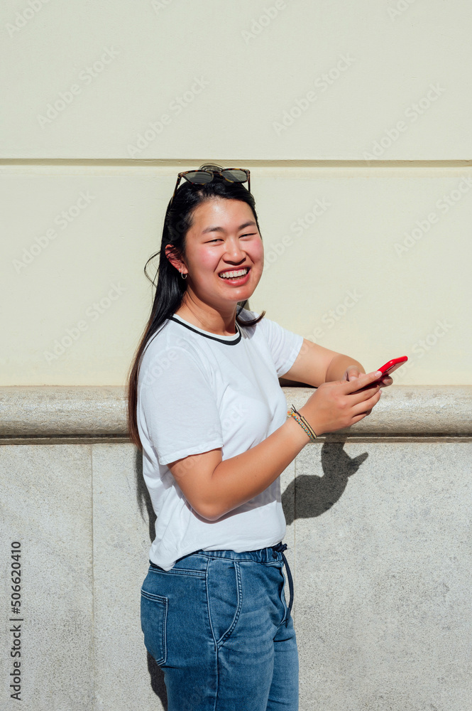 Portrait of elegant young asian woman using smart phone Portrait of elegant young asian woman using smart phone