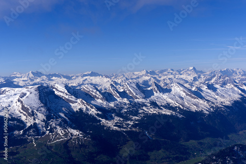 Aerial view over the Swiss Alps with Churfirsten and Toggenburg Valley seen from Säntis peak at Alpstein Mountains on a sunny spring day. Photo taken April 19th, 2022, Säntis, Switzerland. © Michael Derrer Fuchs