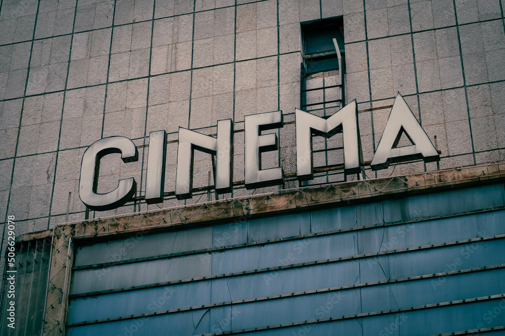old cinema sign on facade